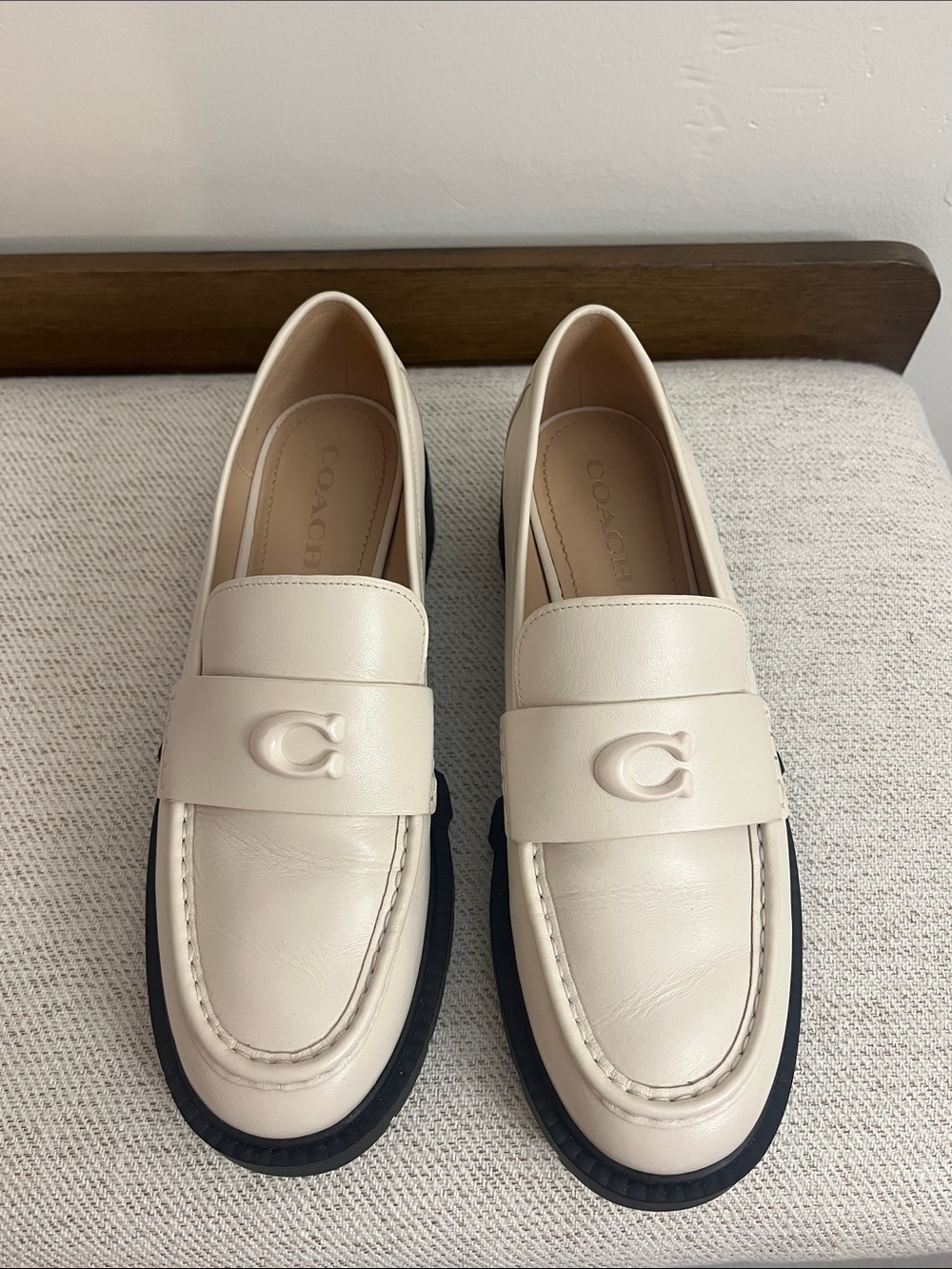 Coach woman’s Cream Leather Penny Loafers with Black Sole